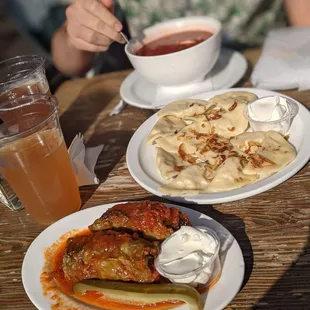 Top to bottom: Borscht, Potato vareniki, Golubsti