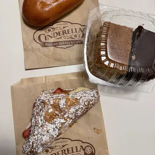 Piroshki, two cake slices and Strawberry Croissant at Cinderella Bakery &amp; Cafe in San Francisco.