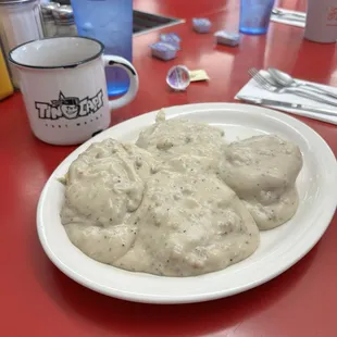 a plate of biscuits and gravy