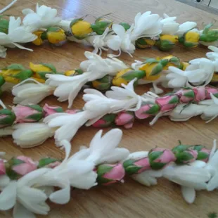 Rosebud lei twist with single  tuberose lei