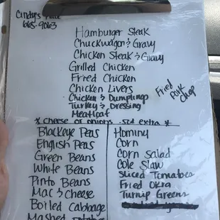 The drive-thru menu. It changes, almost daily. As of 5/19, it's about $8 for a meat, 3 vegetables, roll or cornbread, and a drink.