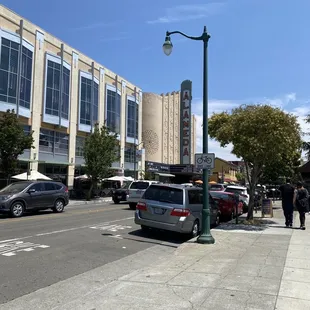 It is located to the left of the alameda theater.