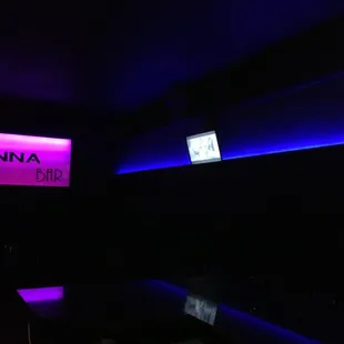 a neon sign in a dark room