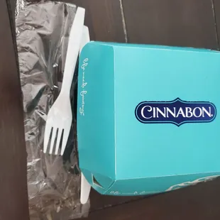 a blue box with a fork and knife in it