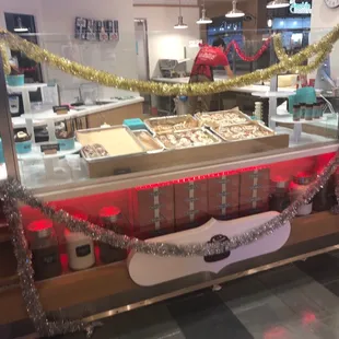 a view of a pastry shop counter