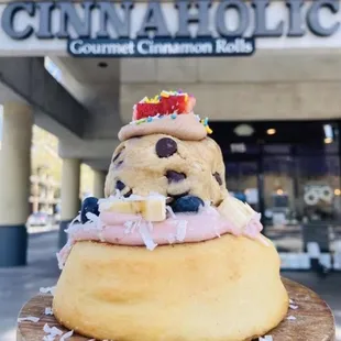 a doughnut topped with icing and sprinkles