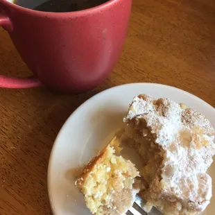 a cup of coffee and a piece of cake