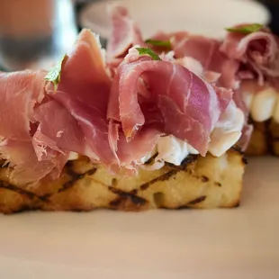 Ricotta toast - prosciutto, apricot mostrada, micro arugula