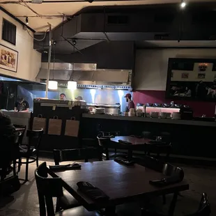 a restaurant with people sitting at tables