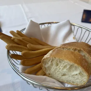 a basket of bread and french fries