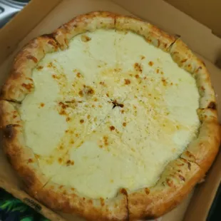 a cheese pizza in a box