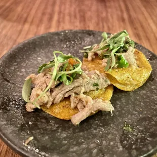 Pork tostada amuse bouche
