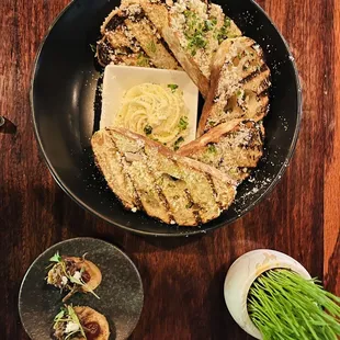 a pan of food on a wooden table
