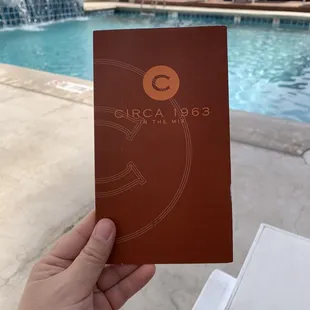 Circa 1963 - drinks and food to order by the pool