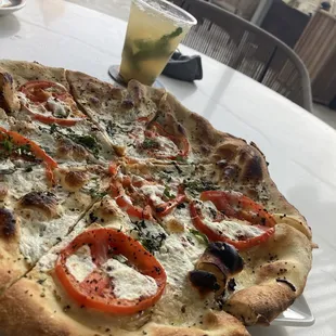 Enjoy a nice pizza with your mojito