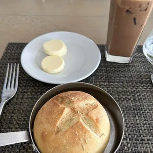 Fresh bread with butter and iced Mocha