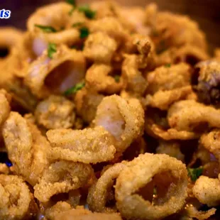 Fried Calamari. Good snack. Kalamata olives, artichokes, and garlic butter sauce could be removed w/minimal impact... LEMON STAYS!