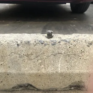 The metal rod is sticking out 2.5 inches.