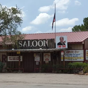 Literal traitor to democracy. They're flying a flat that says Rigged 2020... and why the huge picture of Biden? Gross.