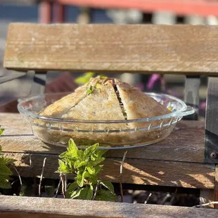 a pie in a glass bowl