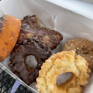 a variety of doughnuts in a box