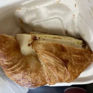 Bacon, egg and cheese croissant sandwich