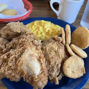 Fried chicken, mac &amp; cheese, fried squash, and a corn bread and a biscuit