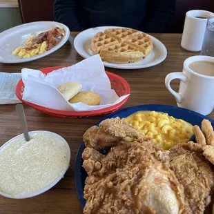 Scrambled eggs and bacon and a Belgian waffle