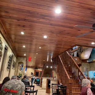 a group of people sitting at tables