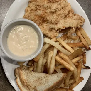 a plate of fried fish and french fries