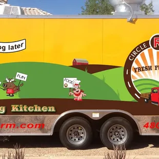 a food truck parked in front of a house