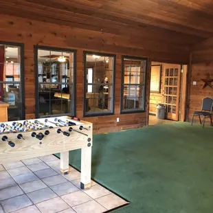 Back of Chisholm Ranch House which serves as a game room