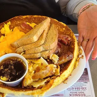 a person holding a plate of food