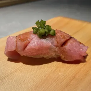 a close up of a piece of sushi