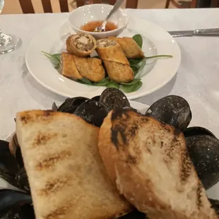 Bowl of large mussels Appetizer eggrolls