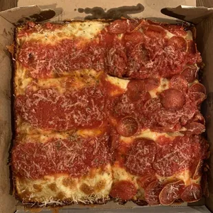 Half cheese half pepperoni square pizza