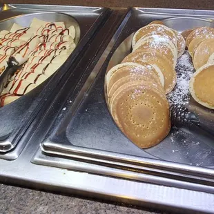 a variety of pastries on trays