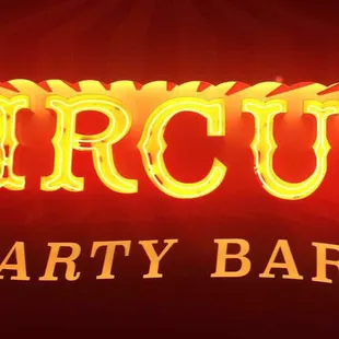a neon sign for a circus
