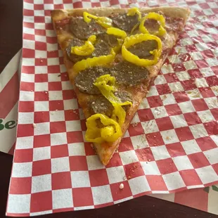 Pizza by the slice with your choice of toppings