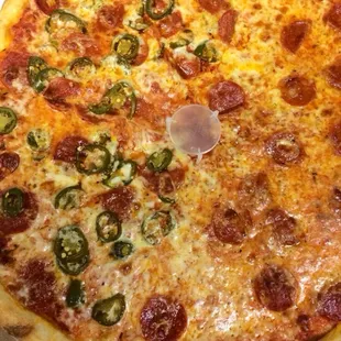 a pepperoni and jalapeno pizza
