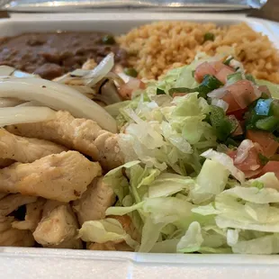 a meal in a styrofoam container