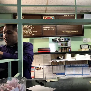 a man working at a counter