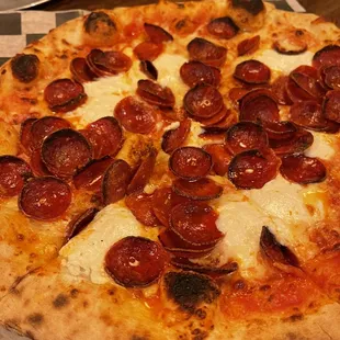 Pepperoni pizza with ricotta added