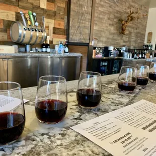 Two wine flights at the bar
