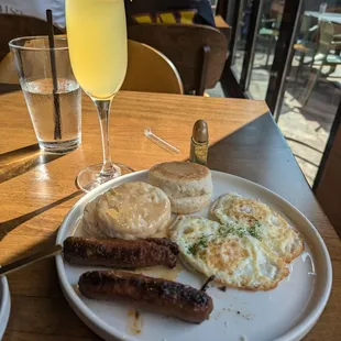 2 eggs, honey biscuit, sausage, mimosa. Forgot to get a pic of the grits
