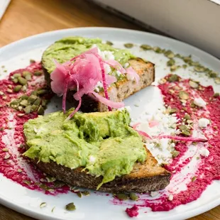 Smashing Avocado toast (2). The plating looks great! If you'd add a poached egg (2,50$ more) it'll double for a filling dish. (8/14/2022)