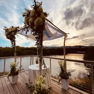 a view of a wedding ceremony on a deck