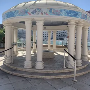 Gazebo with an outdoor fire pit.