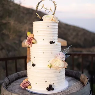 Our passion fruit cake with fresh berries and flowers from Flowers by Mae Mae