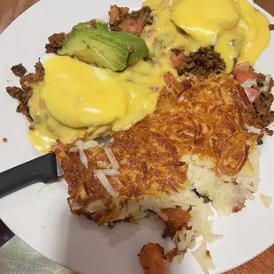 One of the eggs benedict's